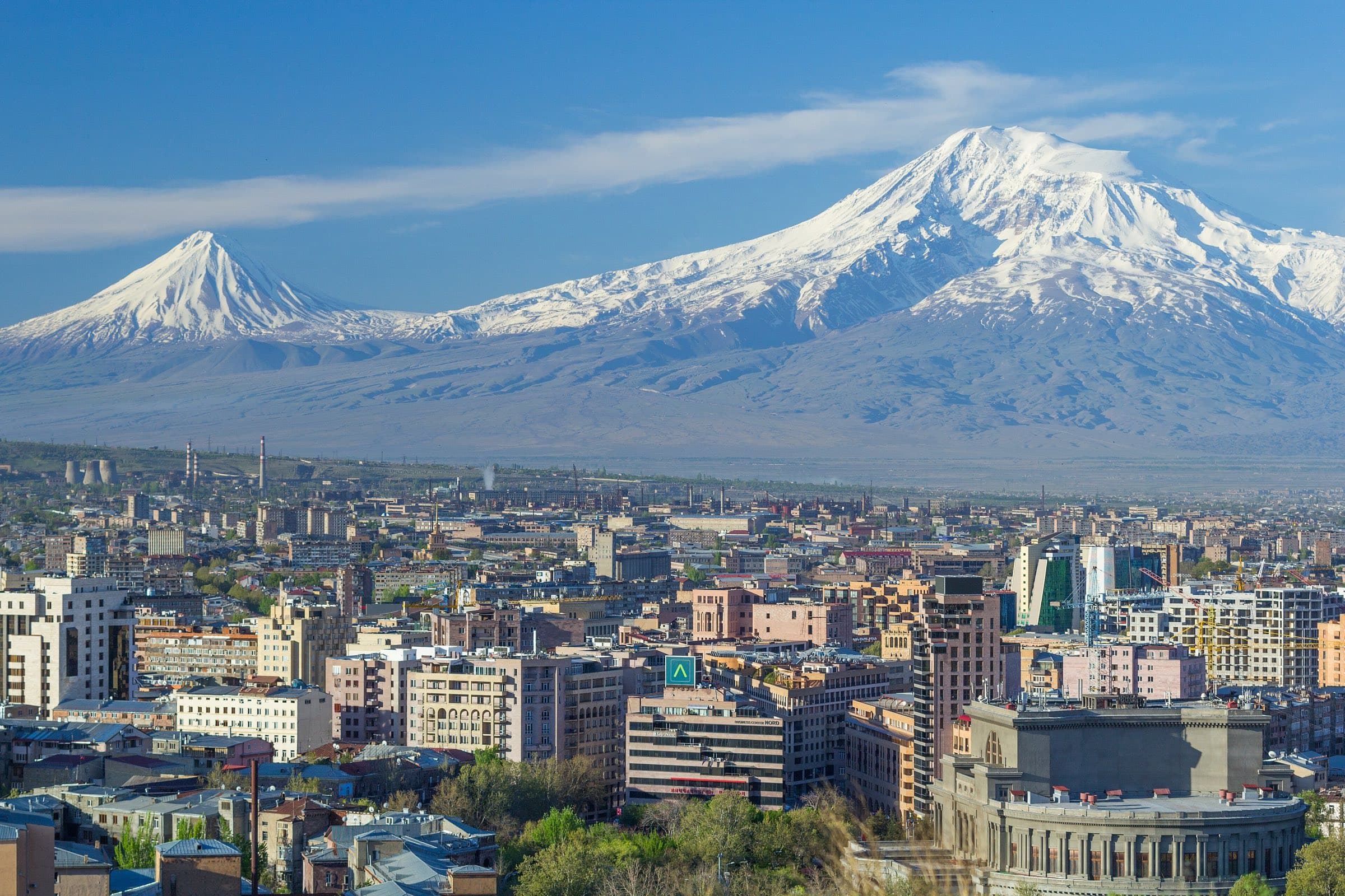Mount Ararat rising behind the Yerevan skyline in spring.